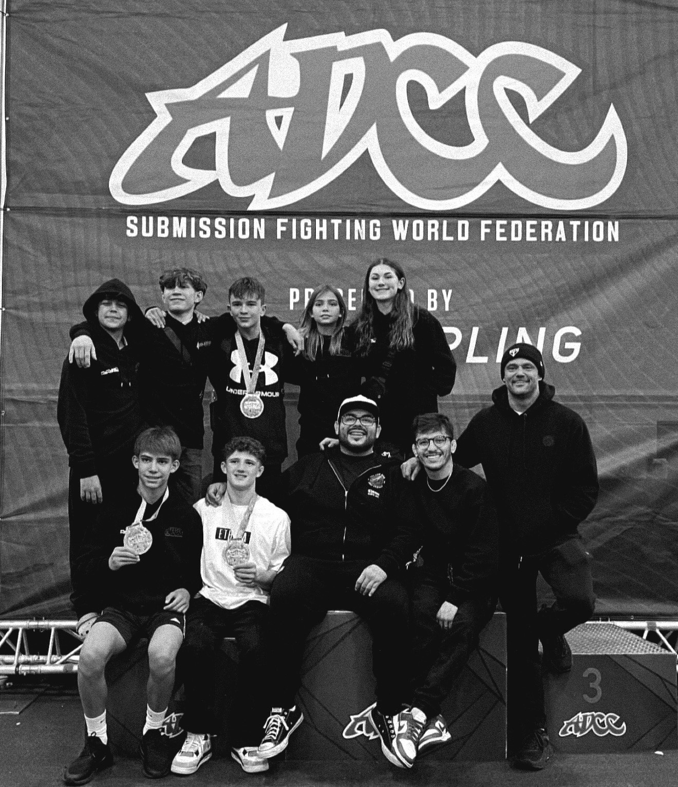 Arizona Fighter Foundation Students Posing At Submission Fighting World Federation